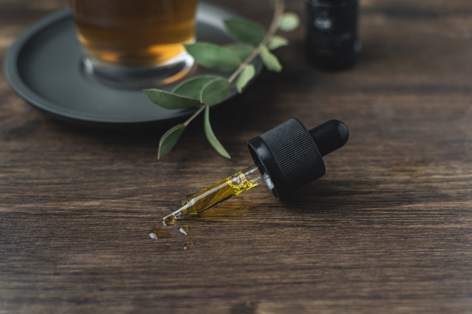 Oil Dropper on a Table
