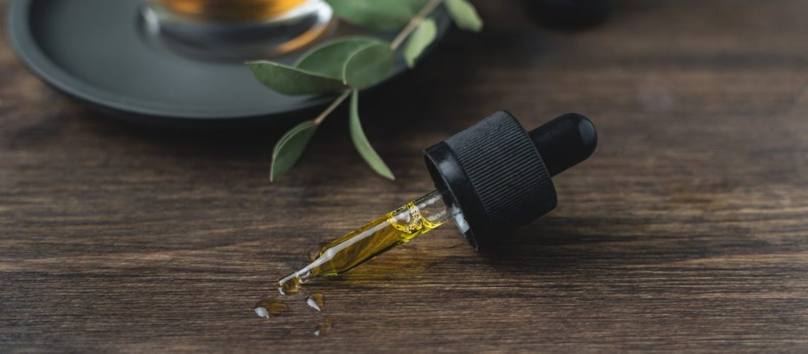 Oil Dropper on a Table